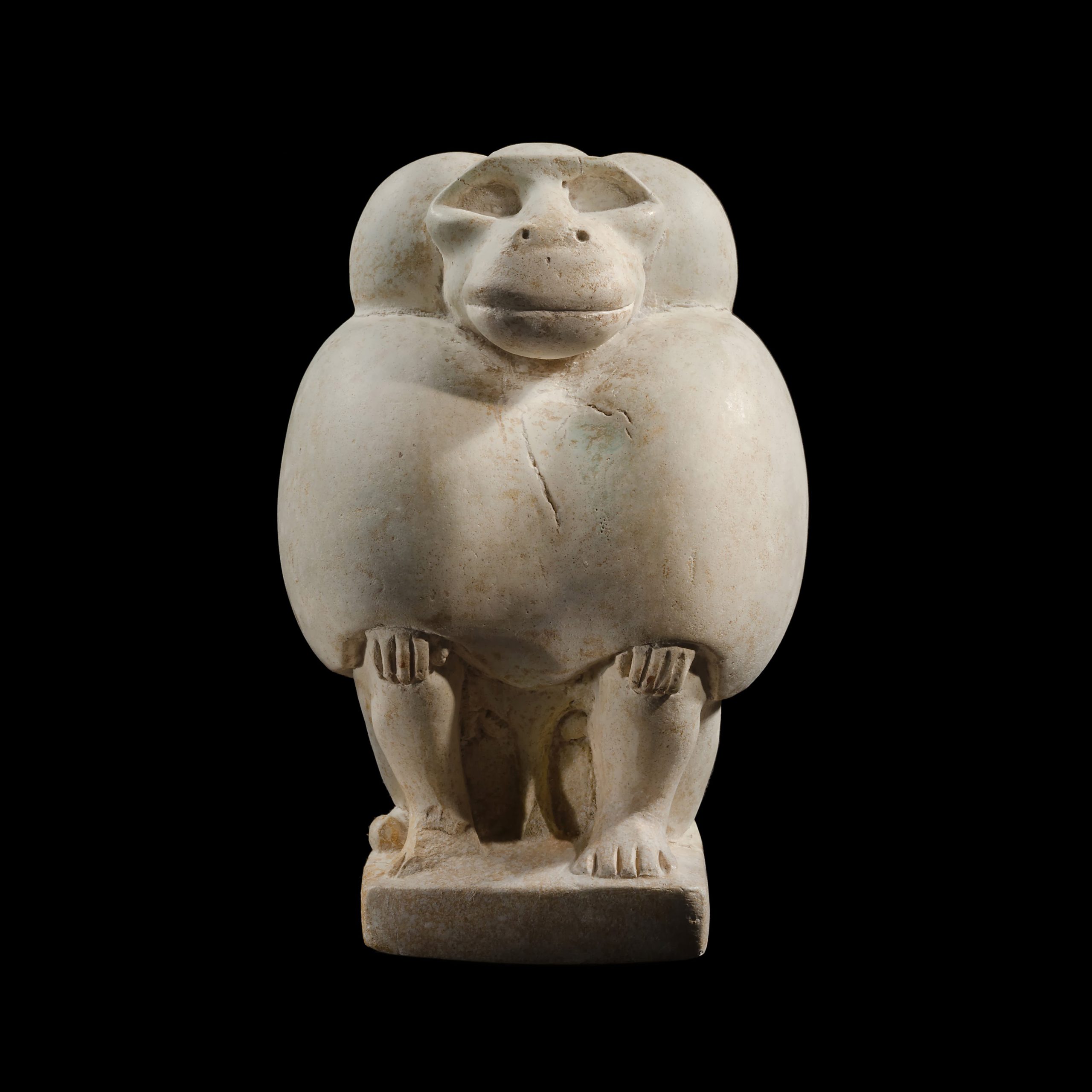 Egyptian Limestone Statuette of a Seated Baboon - Phoenix Ancient Art